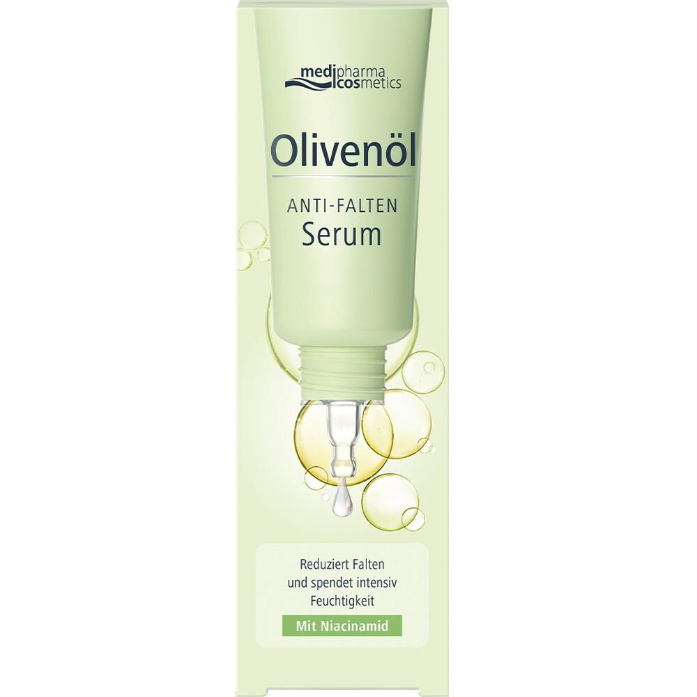 Eine grüne Tube Olivenöl Anti-Falten Serum mit Tropfen und Blasen.